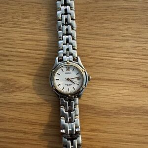 Seiko Gold and Silver Watch with White Dial